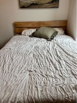 Queen bed frame with mattress and two night stands