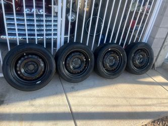 Set of 4 16" Steel Wheels/Rims & Tires - 205/55R16
