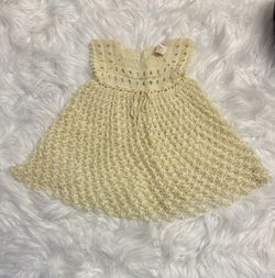 Vintage hand knitted crocheted baby girl dress by Didi - cream with blue flowers on bodice