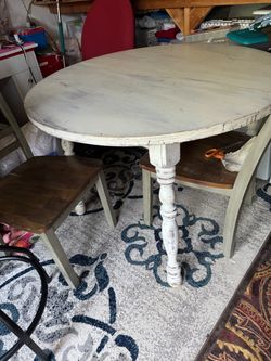 Round table and two chairs
