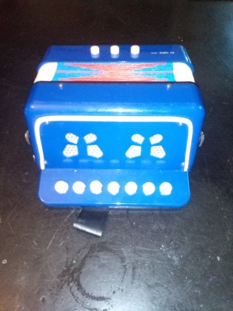 Child's Seven Button Accordion