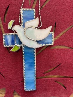 Handcrafted By  D.  A beautiful stained glass cross with the dove of peace.