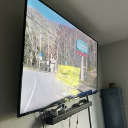 65” 4K TV with Sound Bar Combo