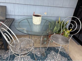 Glass table with chairs
