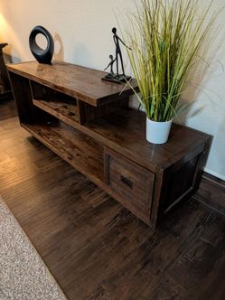 rustic / farmhouse-style media console (TV stand lowboard).