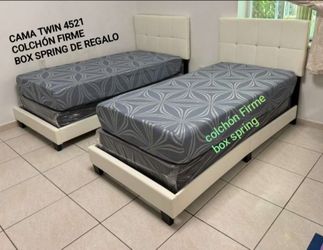 New twin beds, mattress included.