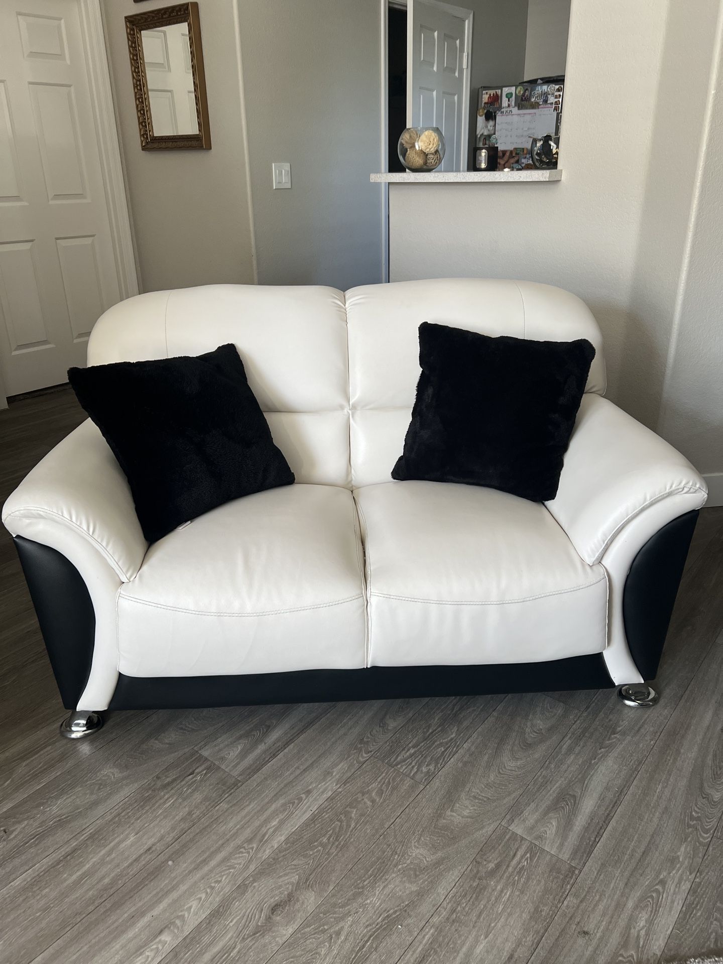 Black and White leather Loveseat