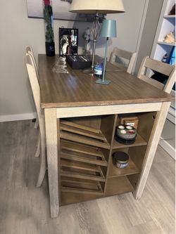 Solid Wood kitchen table with wine rack and 4 chairs