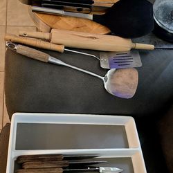 Custom cutting / charcuterie board and other essentials.  Cutting and steak knives, grilling tools...