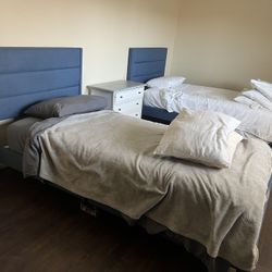 2 Twin Beds With Bedding And Night Stand