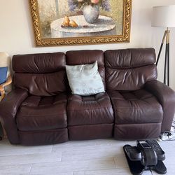 Leather mechanic sofa. Left side turns into a lazy boy. Great quality keather