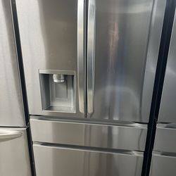NEW OPEN BOX LG FOUR DOOR REFRIGERATOR STAINLESS STEEL