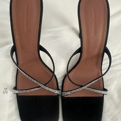 Amina Muaddi Black heels 