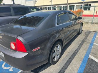 2011 Chevy Malibu, 120k miles, it's registered runs good OBO