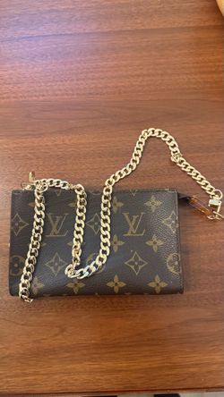 Louis Vuitton Monogram pouch with chain
