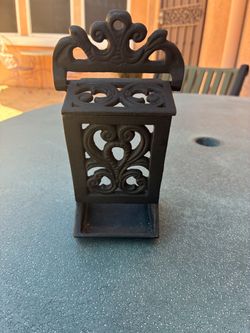 Collectible cast-iron stick match holder price is firm