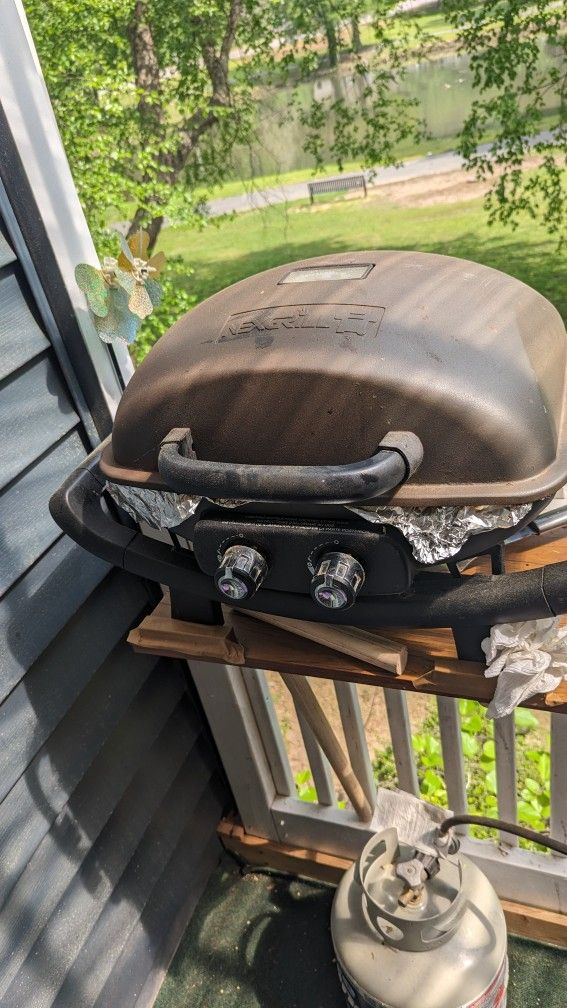 Grill And Propane Tank