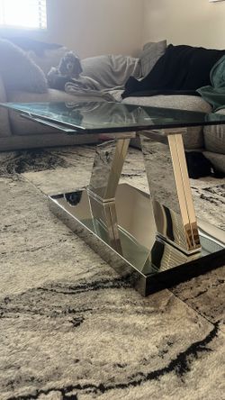 Swivel center glass table