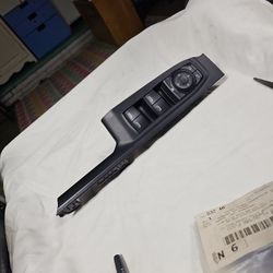 19-25 GM/ Chevy Silverado OEM Front Driver Side Door Accessory Switch Mount Plate