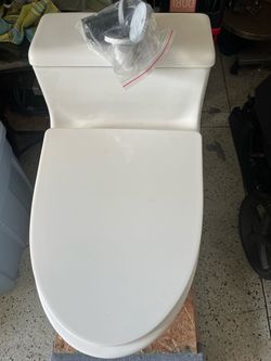 White Two-Piece Toilet with Hardware