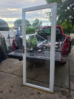 32x80 Pella universal storm door Price firm
