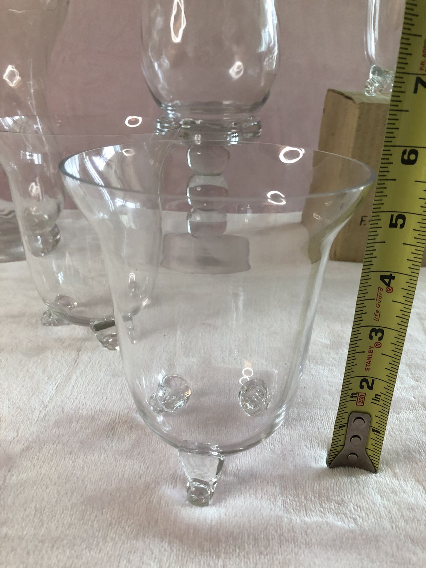 75 glass vases plus 4 taller vases