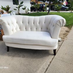 white wing back loveseat