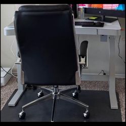 Adjustable height desk with dry erasable glass top