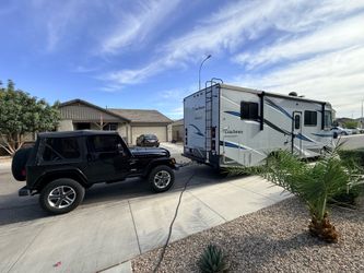 2021 coachmen pursuit 27 XPS RV with 1997 Jeep Wrangler toad