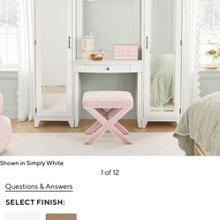 White vanity towers with table and mirror