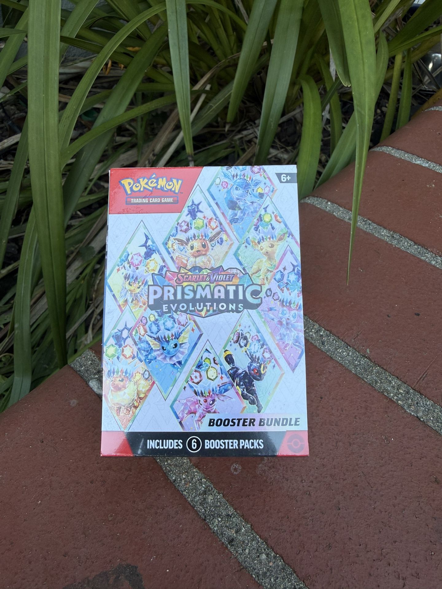 Pokemon Prismatic Evolutions Booster Bundle - engenhariafw.com.br
