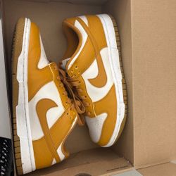 Yellow Nike dunk lows