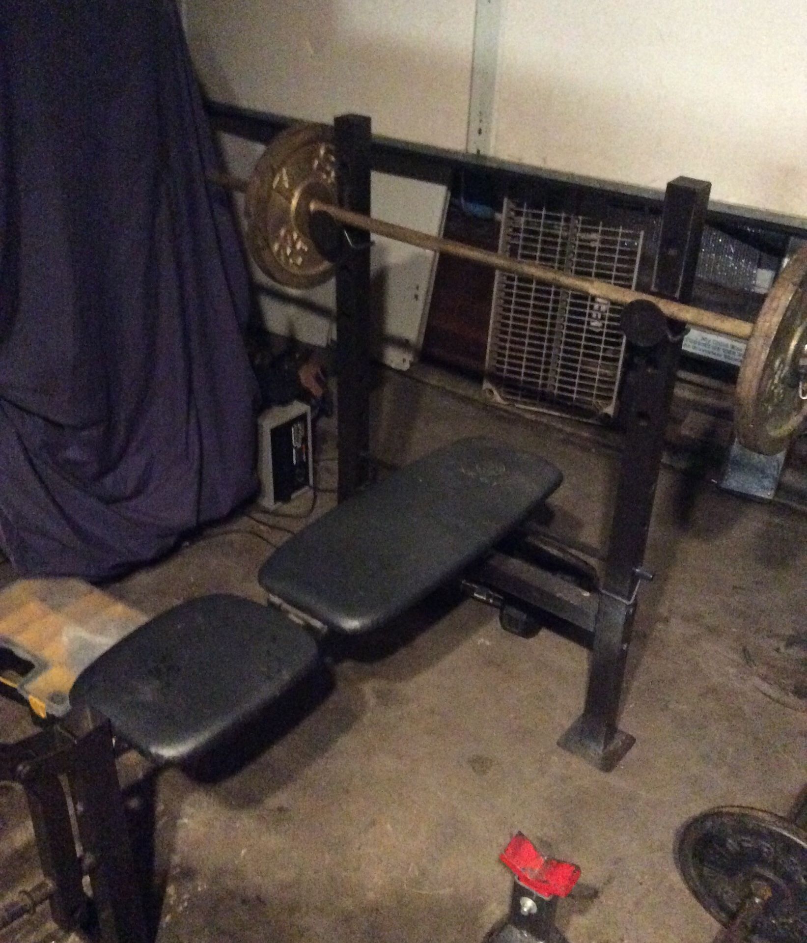 Bench press machine - Golds Gym comes with bar and two 22 lbs weights $70 OBO - make me an offer