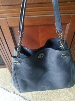 Blue Coach leather bag.