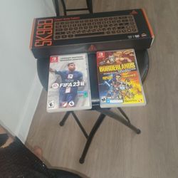 Keyboard  With Two Nintendo Switch Games  