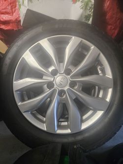 4 kia wheels  w/snow tires