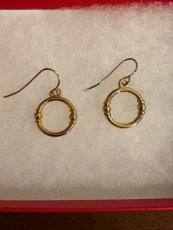 Gold toned earrings- never used