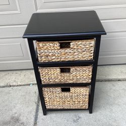 Storage container with three wicker drawers for storage a black all wood base 17.75 long-13 deep—-30tal