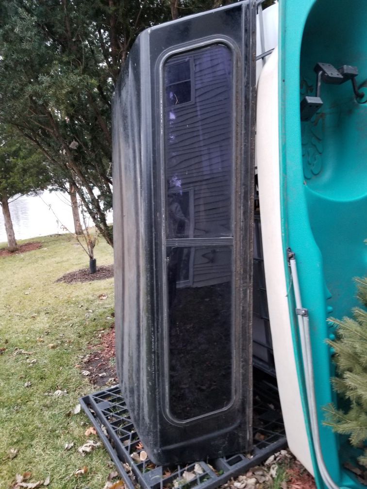 Camper for truck bed,old, missing rear glass on the door