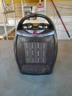Small Personal 1500 Watt Fan Forced Ceramic Electric Space Heater.