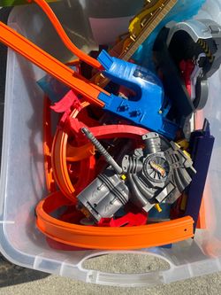 Assorted Hot Wheels track set includes various orange track segments