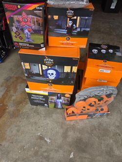 Halloween blow up 4 of them  5 boxes of skull 💀 lights  stakes