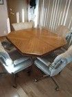 Dinning room Table with Extension and Cloth Tilting Chairs