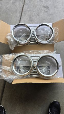 61 IMPALA HEADLIGHT BEZELS