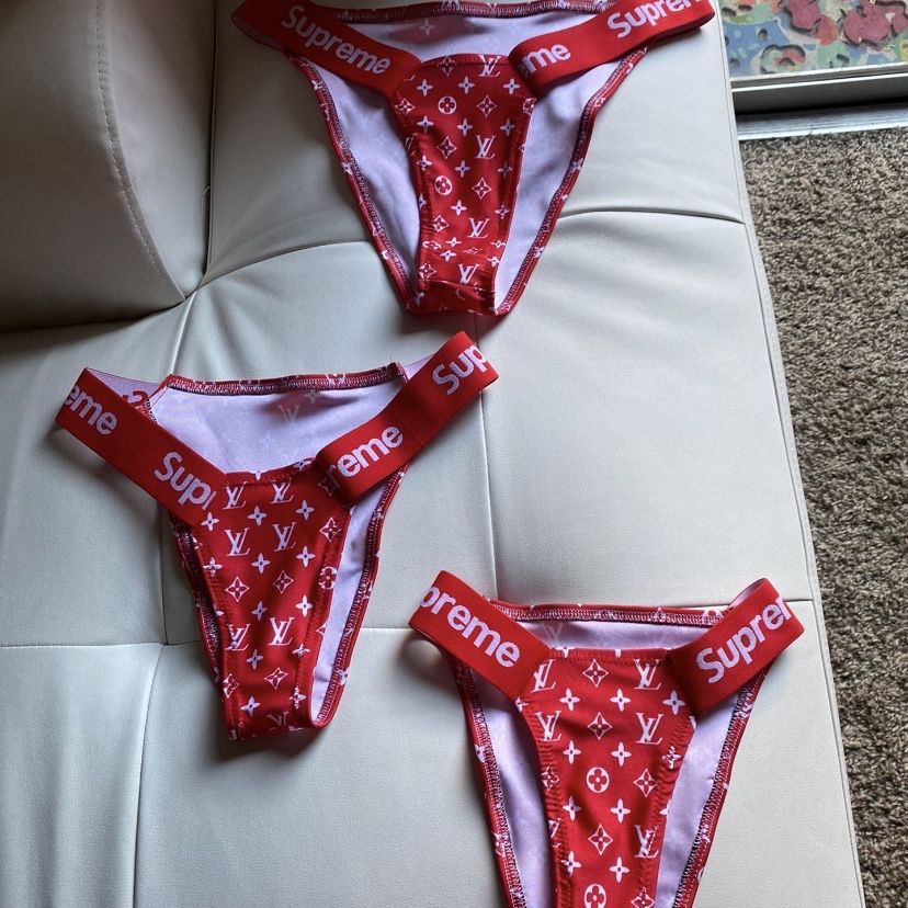 Red & white LV supreme swimming trunks sz s for Sale in Hempstead, NY -  OfferUp