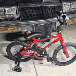 Brand new huffy  16 boys bike with training wheels