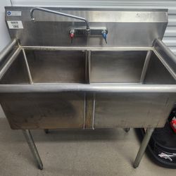 Two compartment stainless steel sink