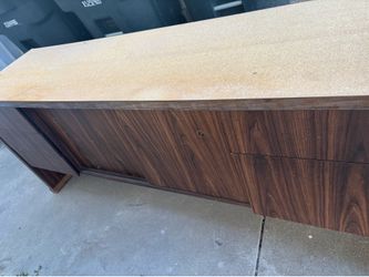 Storage cabinet with drawers and sliding closing shelves