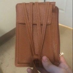 A coffee-colored wallet in the morning
