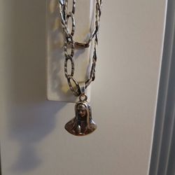 Silver chain with the virgin